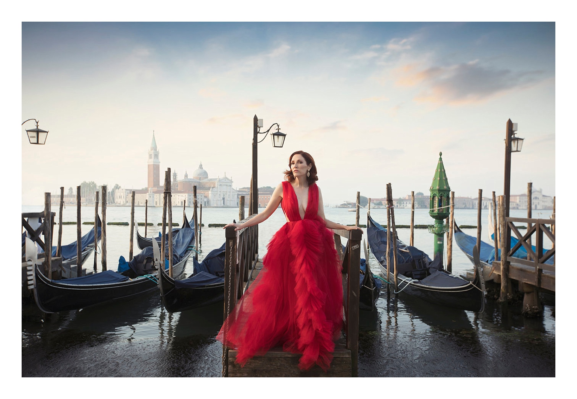 women abroad portraits, woman in red dress posing at boating dock