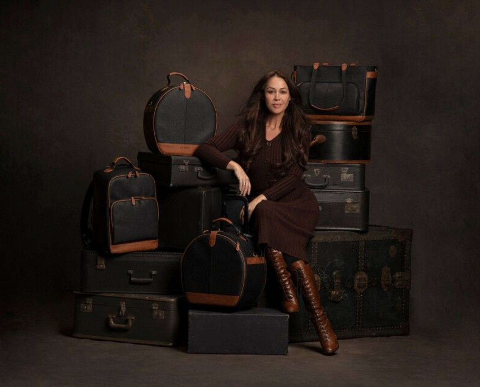 Sue Bryce posing with Tenba Camera Bags