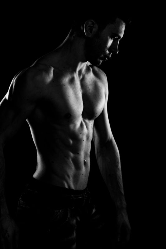 black and white portrait of muscular man, athlete photo, featured photographer sue bryce education